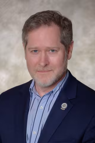 Dr. George (Trey) Lee